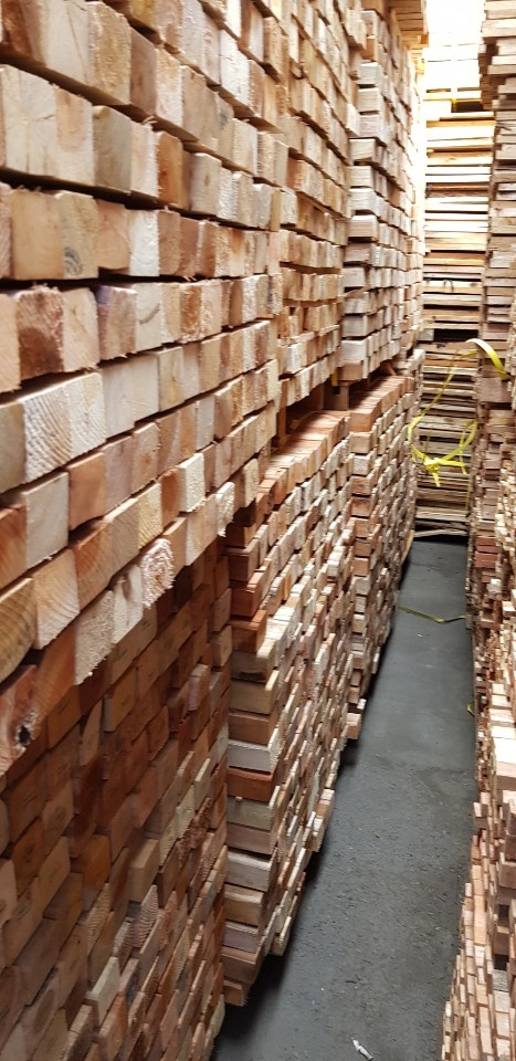Manufacturing floor with milled lumber